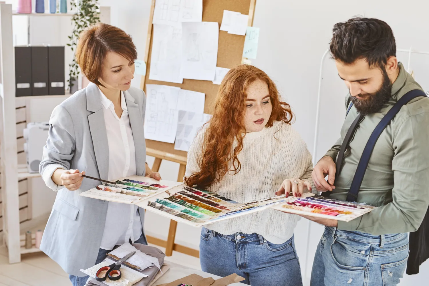 Design team working on brand colours together