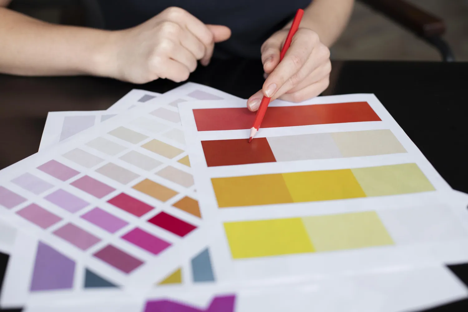 Designer selecting brand colours from a palette