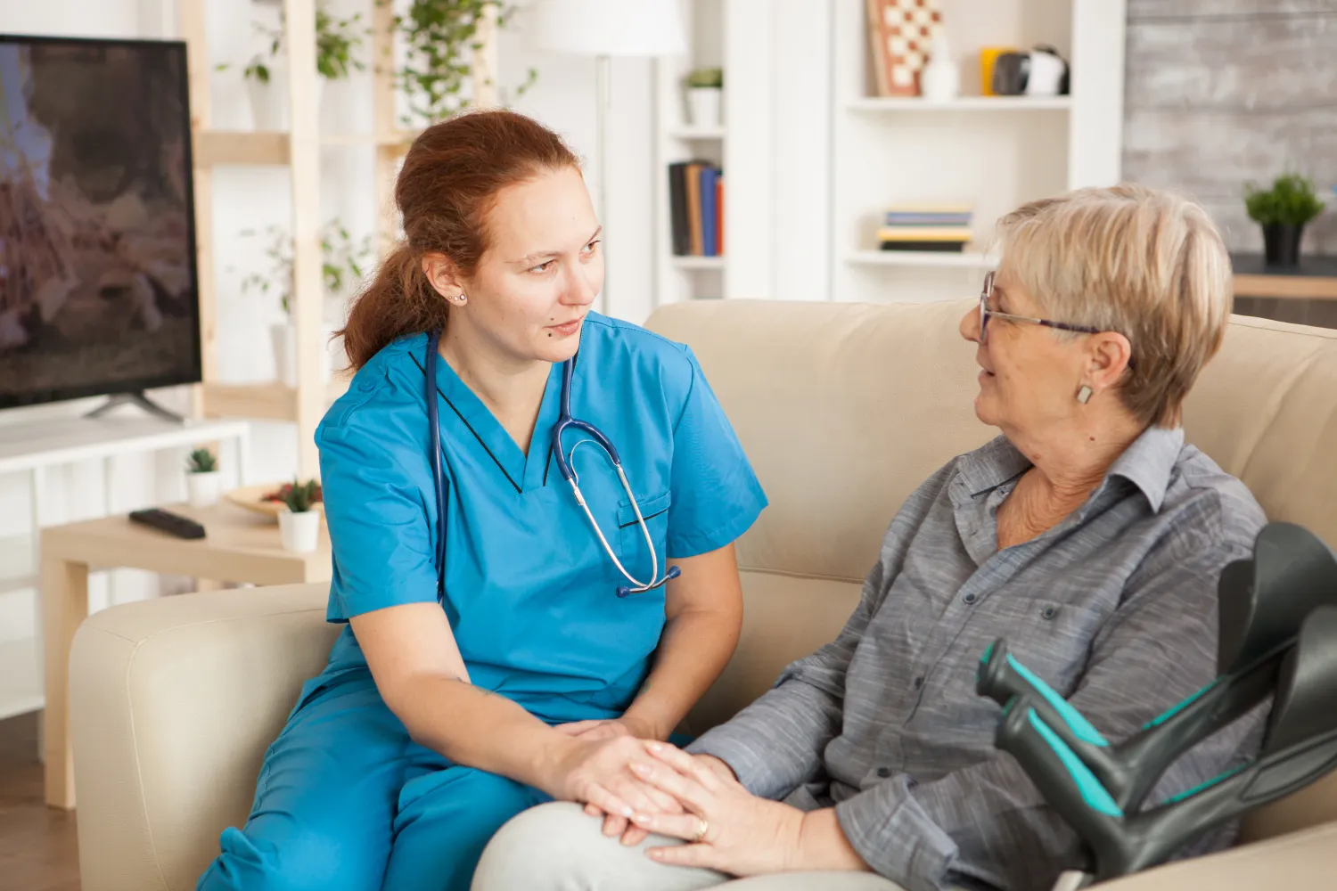 Care worker in conversation with a resident