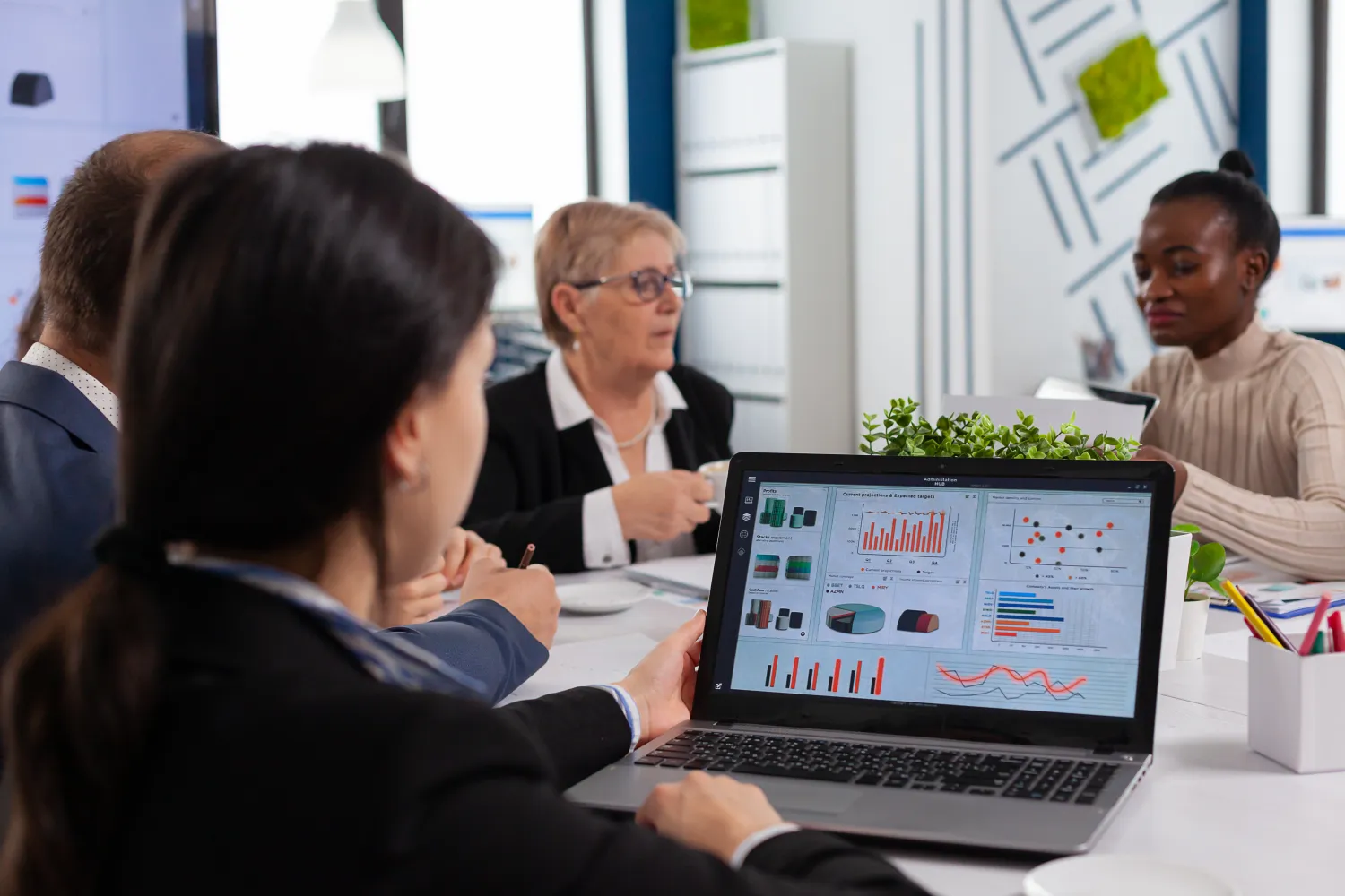 Marketing team analysing website analytics together