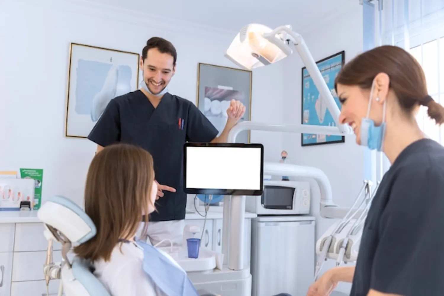 Dentist and patient in a modern UK dental clinic