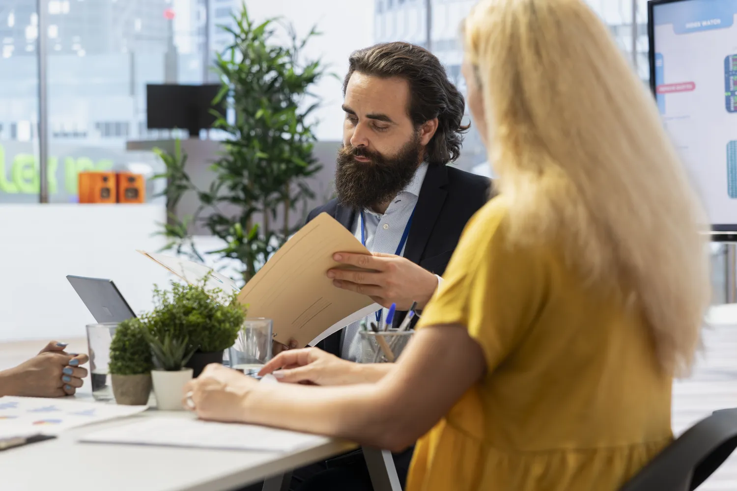 Financial adviser meeting clients