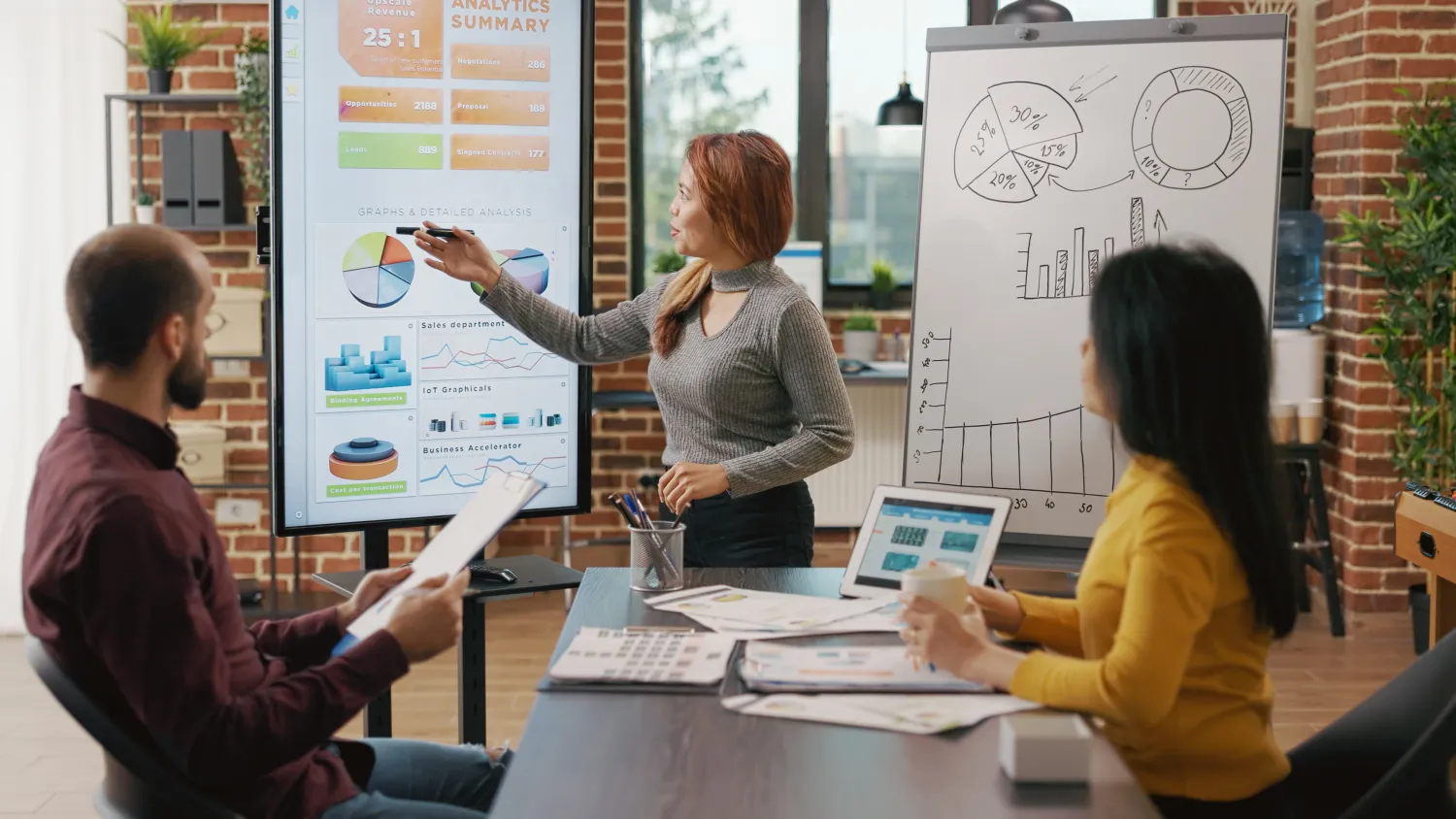 Team reviewing performance charts in a meeting