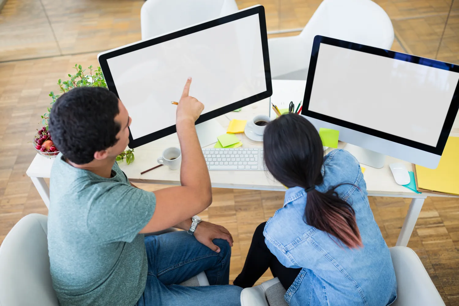 Web team reviewing a website design on screen