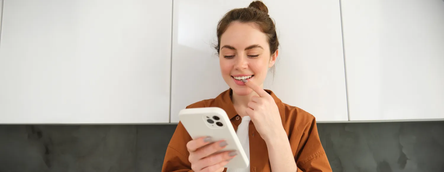 Happy customer leaving a five-star Google review on a smartphone