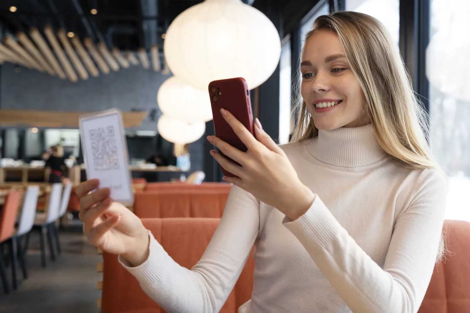 Customer scanning a QR code to leave a Google review