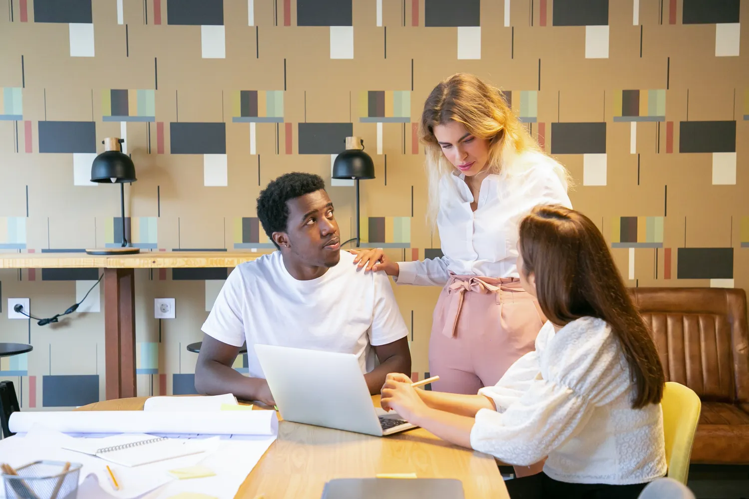Content marketing team planning together in an office