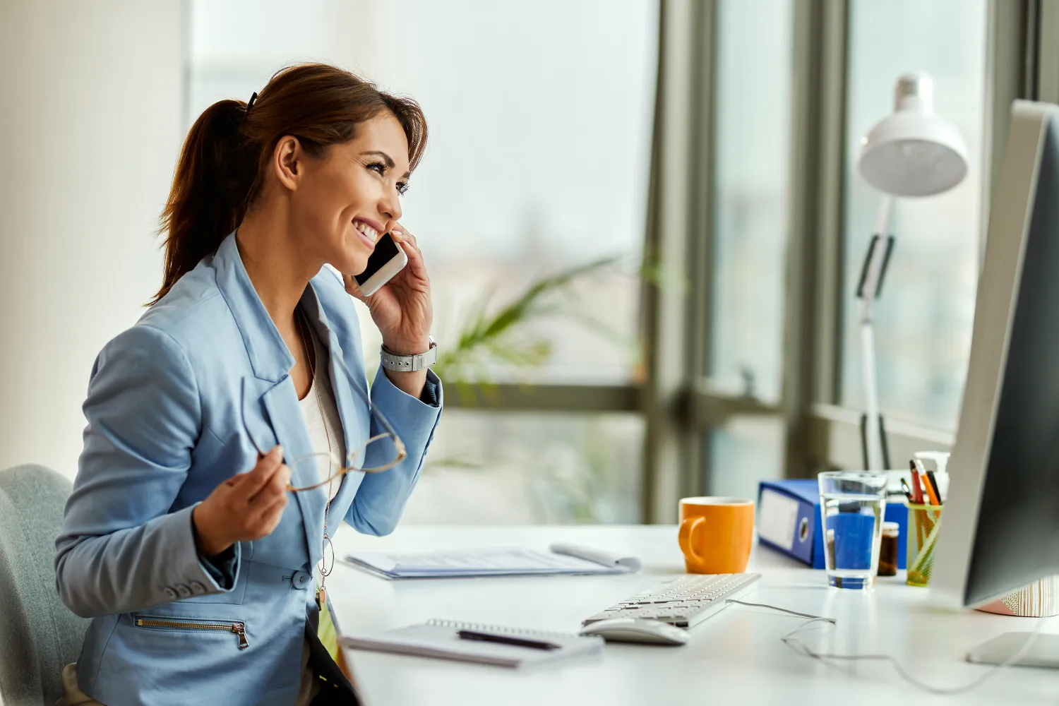 Business owner following up a lead by phone