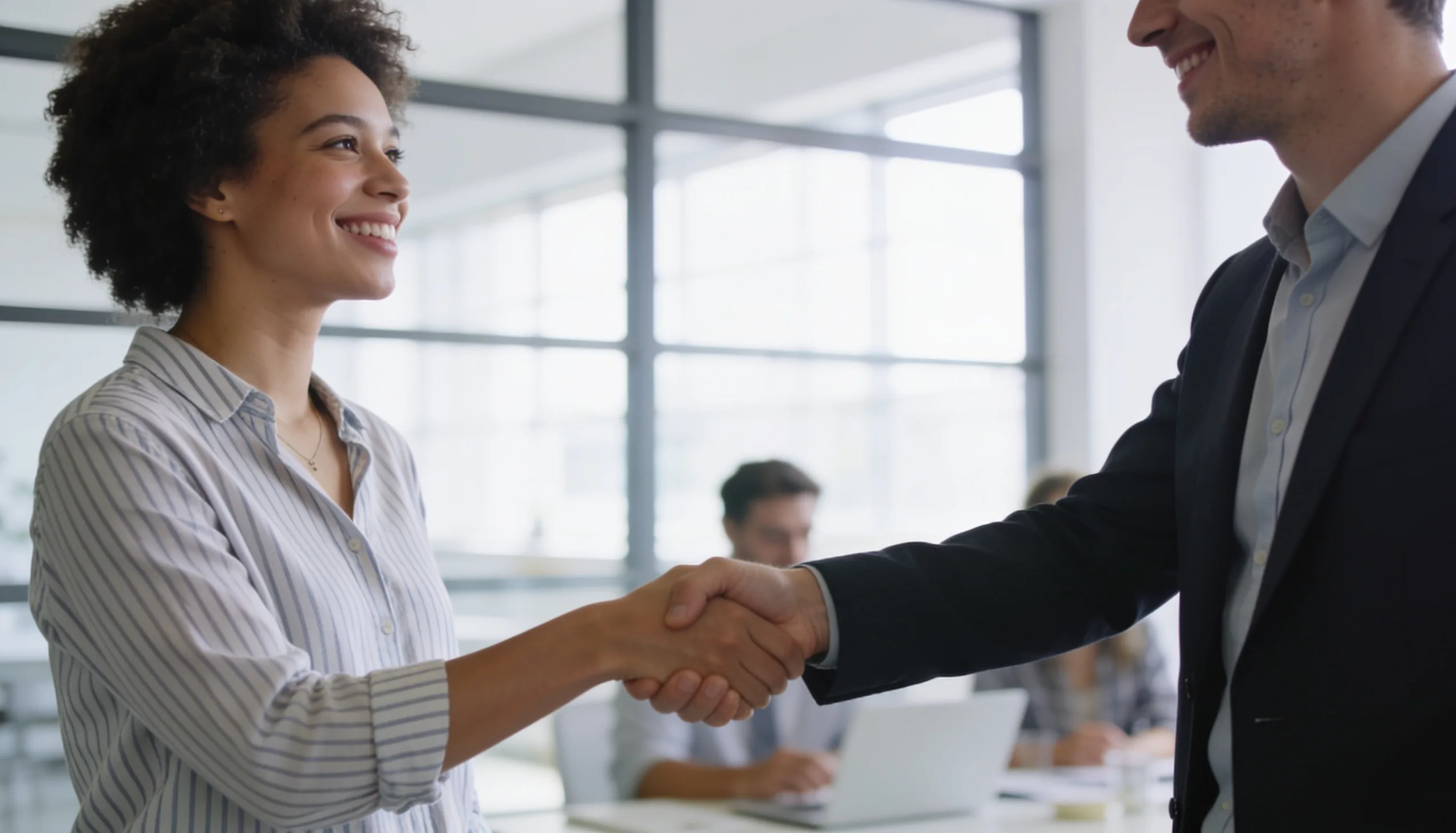 Business partners shaking hands representing digital PR and link partnerships