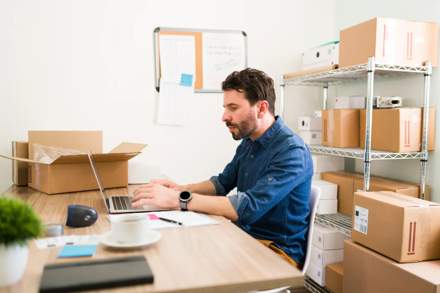 Online store owner adding products to their Shopify shop