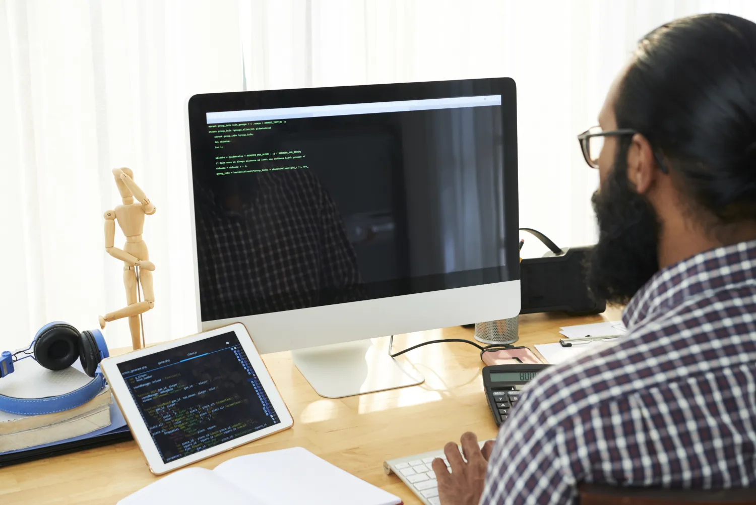 Engineer reviewing site performance on screen