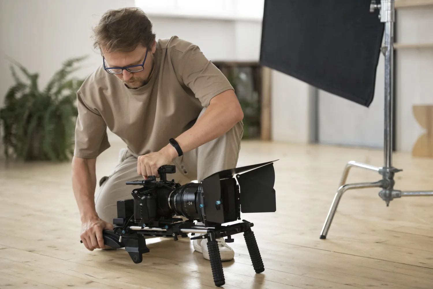 Videographer filming with a professional camera