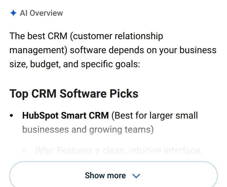 Google’s AI Overview for “best crm software” on a phone, 14 October 2026, naming HubSpot Smart CRM first, with the rest of the answer behind “Show more”